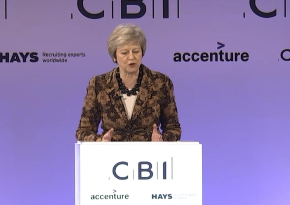 May: Umowa w sprawie brexitu zakończy uprzywilejowanie dla migrantów z UE