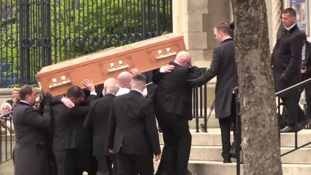 T. May  wzięła udział w pogrzebie dziennikarki zastrzelonej podczas zamieszek w Londonderry