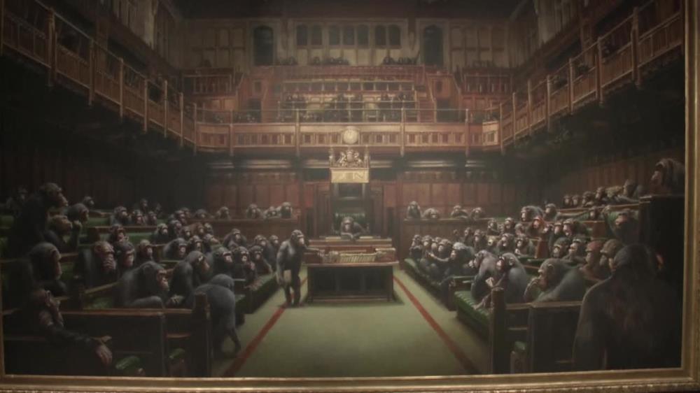 Obraz Banksy'ego sprzedany za rekordową kwotę. Blisko 10 mln funtów za parlament pełen szympansów